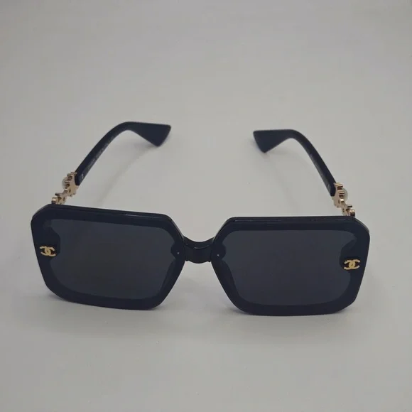 CHANEL Elegant Black Sunglasses with Gold Accents - Picture 2 of 6